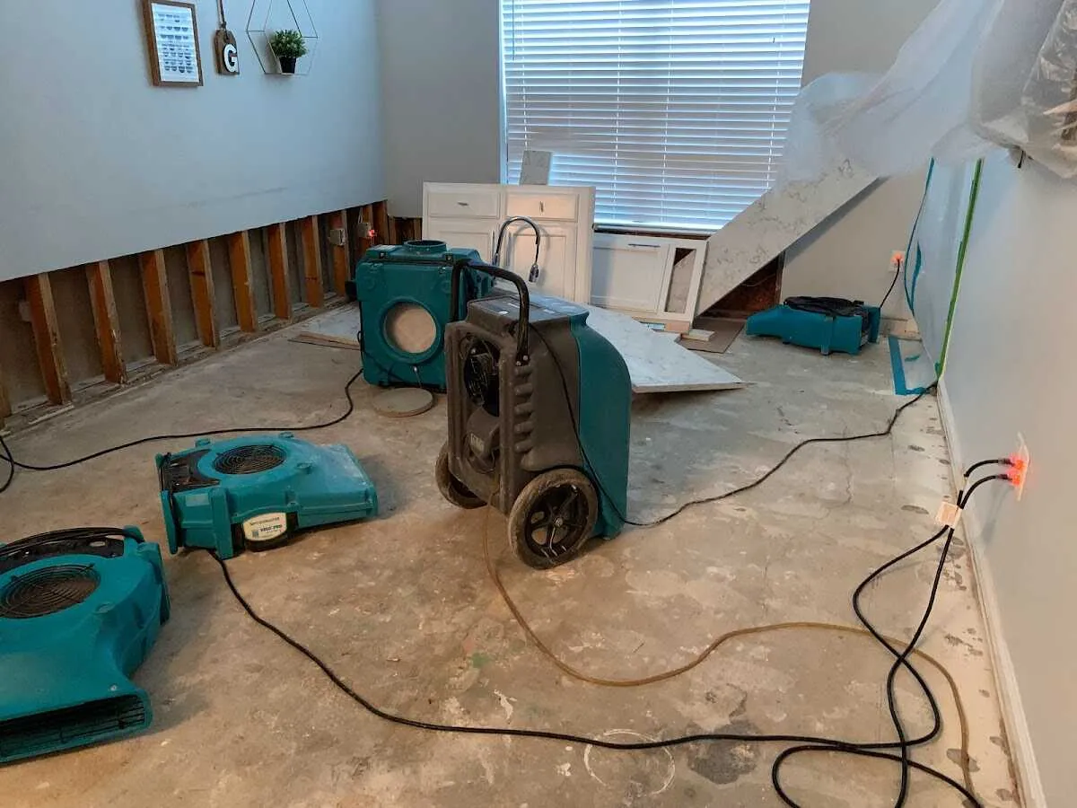 Dehumidifier in flood-cut room for Water Damage Restoration in Williams